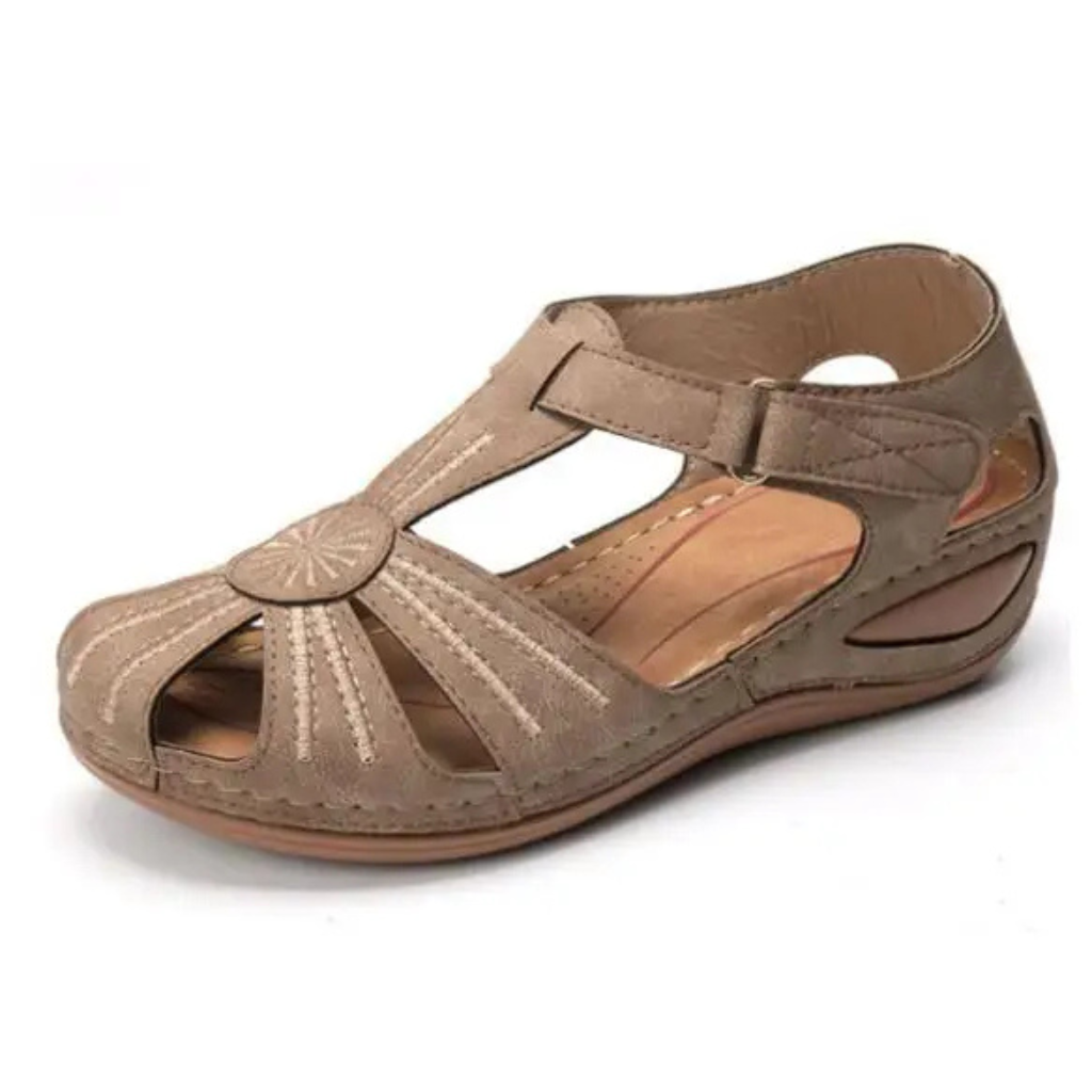 Women's comfortable orthopedic sandal with ergonomic design and adjustable straps, perfect for summer days.






