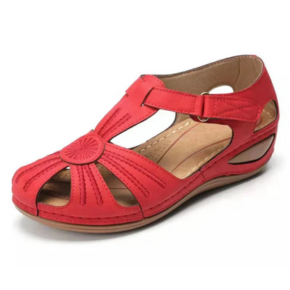 Women's comfortable orthopedic sandal with ergonomic design and adjustable straps, perfect for summer days.






