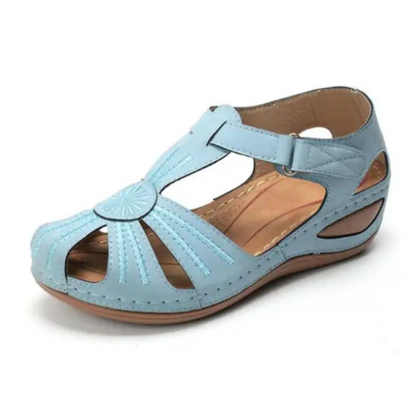 Women's comfortable orthopedic sandal with ergonomic design and adjustable straps, perfect for summer days.






