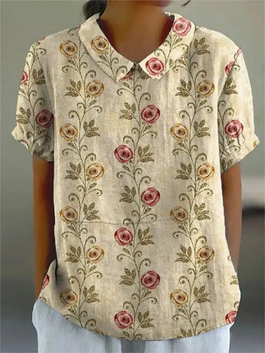  Women's comfy floral blouse with lightweight, breathable fabric and elegant design, ideal for summer days.