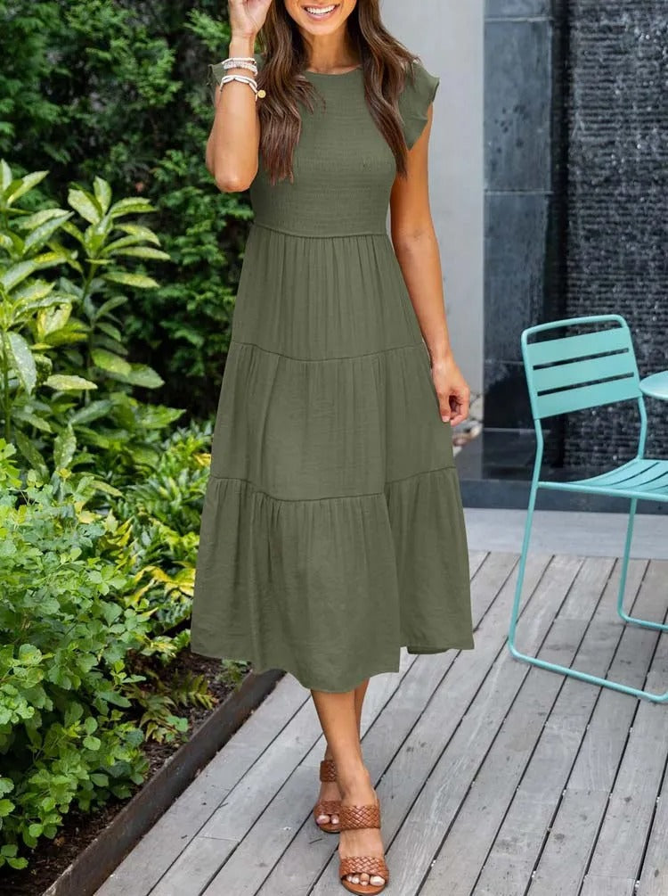 Women's elegant belly-covering summer dress with a flattering fit and breathable fabric, ideal for casual outings and special occasions on summer days.






