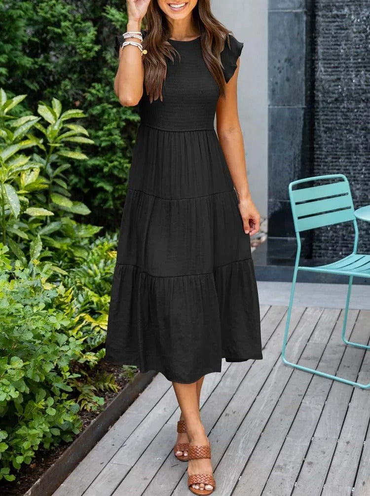 Women's elegant belly-covering summer dress with a flattering fit and breathable fabric, ideal for casual outings and special occasions on summer days.






