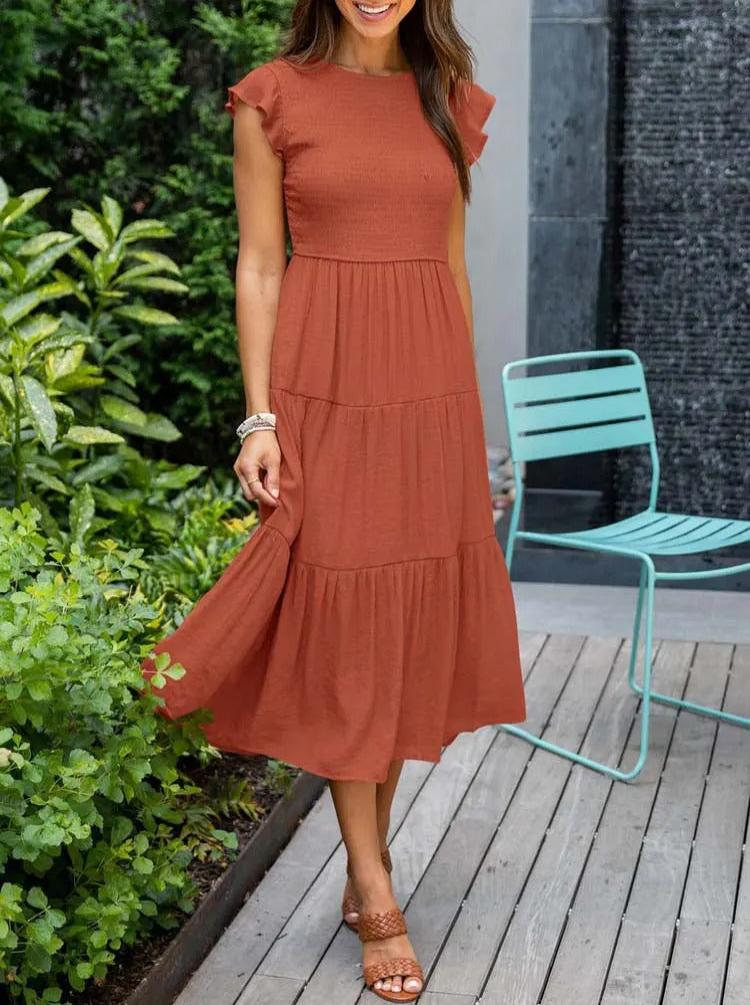 Women's elegant belly-covering summer dress with a flattering fit and breathable fabric, ideal for casual outings and special occasions on summer days.






