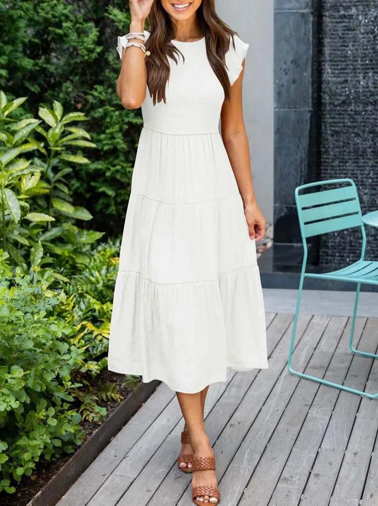 Women's elegant belly-covering summer dress with a flattering fit and breathable fabric, ideal for casual outings and special occasions on summer days.






