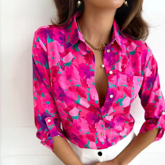 Women’s floral button-down blouse with a lightweight and breathable design, perfect for summer days.