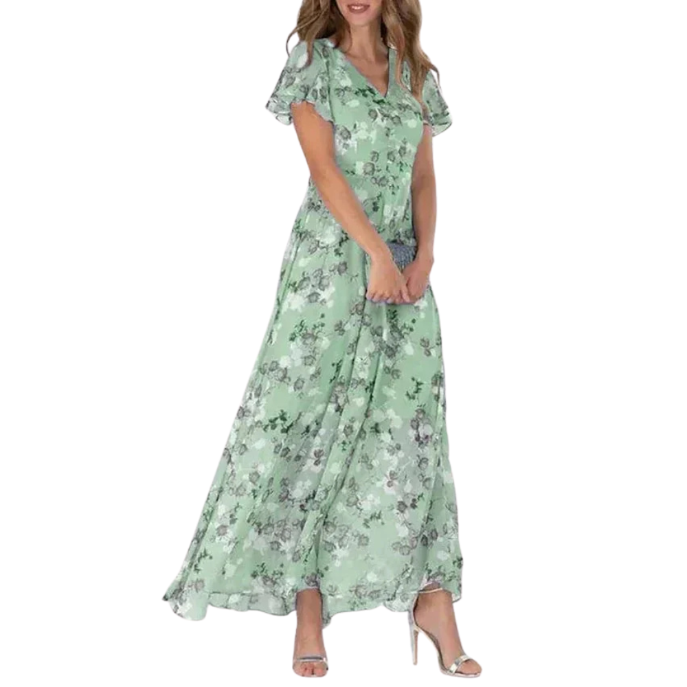 Women's elegant floral long dress with a flowing silhouette and timeless design, ideal for summer days and special occasions.






