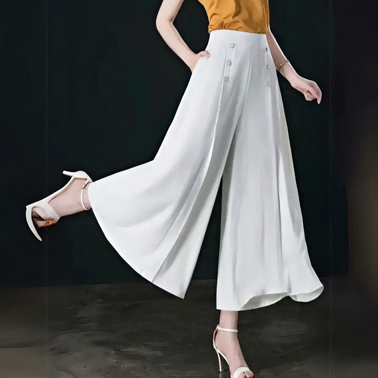 Women's elegant wide-leg pants with a flowing silhouette, lightweight fabric, and versatile design, ideal for warm summer days.