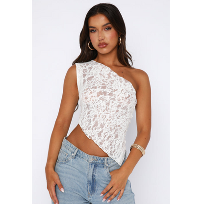 Women's lacey summer top with elegant lace detailing, breathable fabric, and a versatile, flattering fit for warm-weather occasions.






