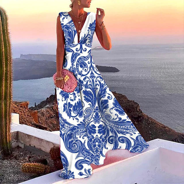 Women's long summer dress with a flowing maxi design, perfect for warm weather and elegant summer occasions.