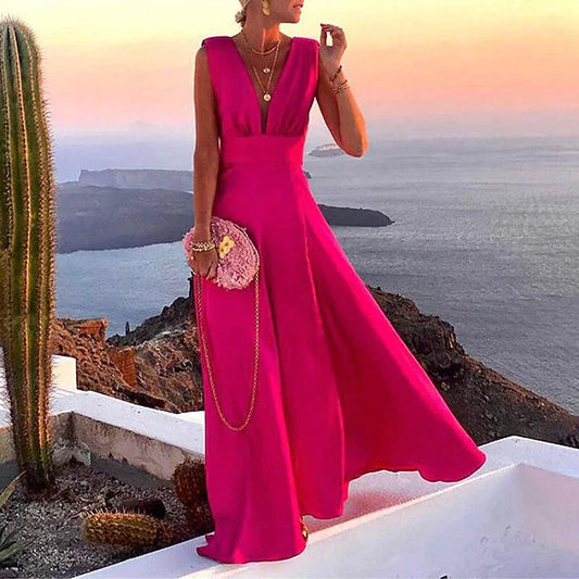 Women's long summer dress with a flowing maxi design, perfect for warm weather and elegant summer occasions.