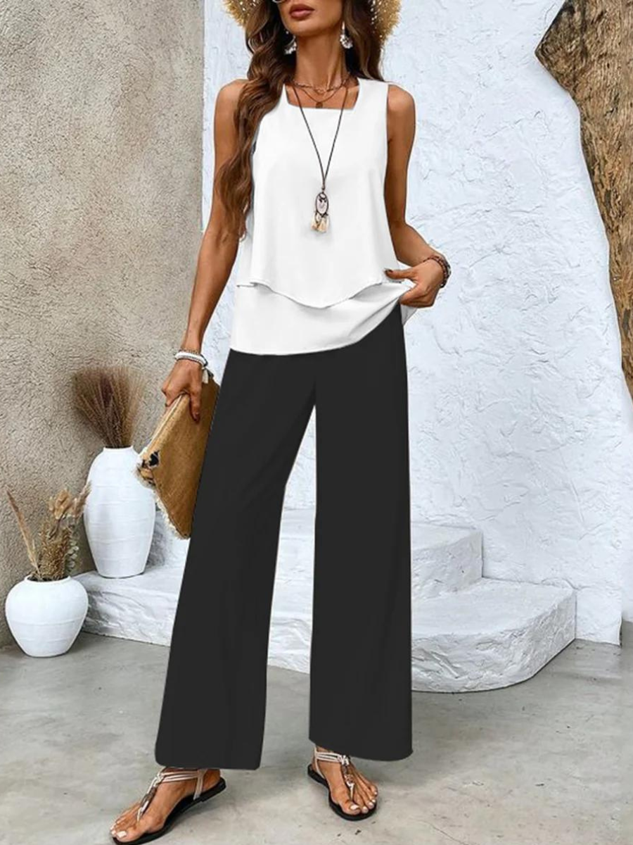 Women's sleeveless top and pants set, designed for summer comfort and style with breathable fabric and modern elegance.