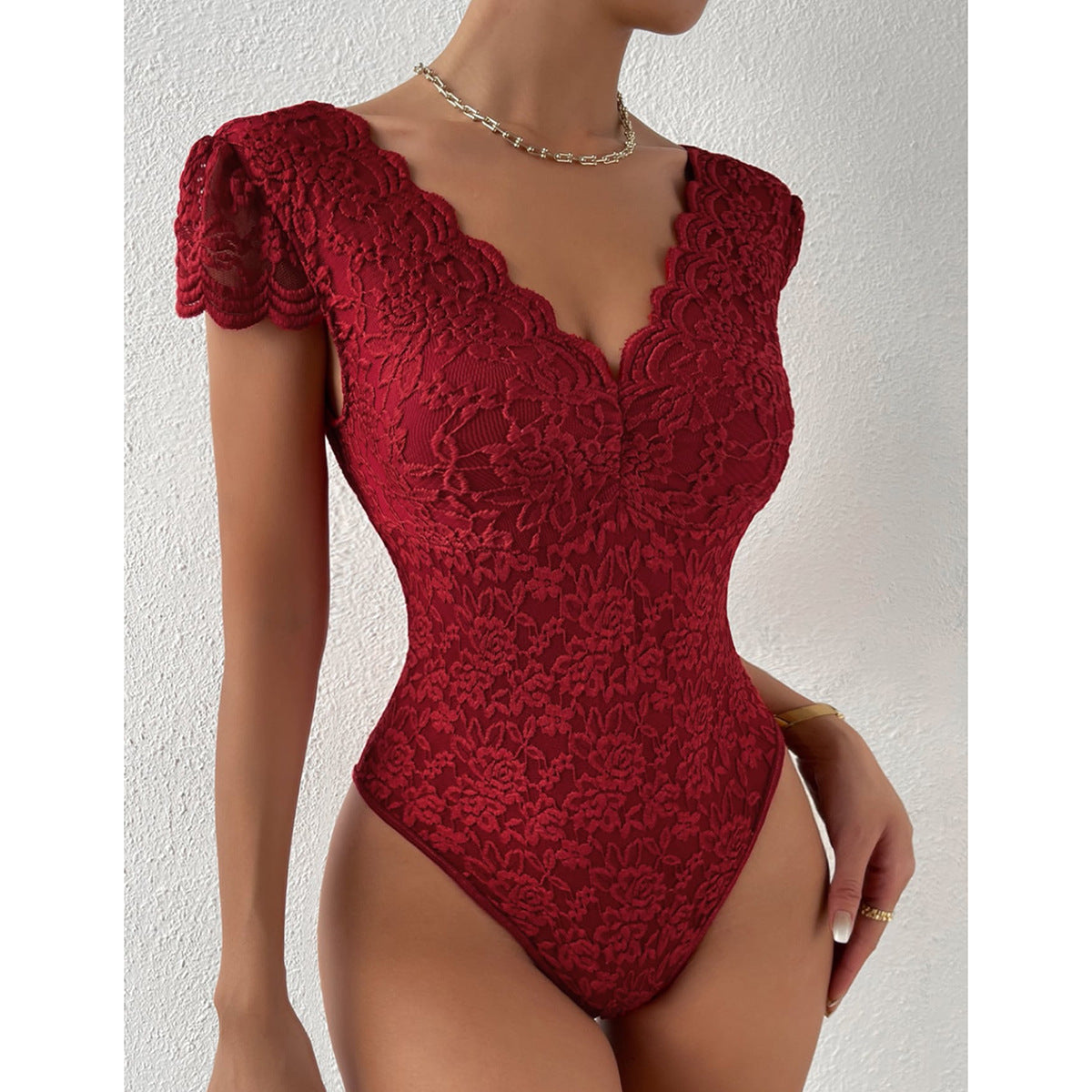 Women's stylish shapewear bodysuit offering tummy control and seamless design for a flattering silhouette and comfortable wear.