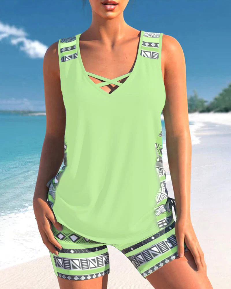  Women's stylish tankini set with a flattering fit, supportive design, and quick-drying fabric, perfect for summer comfort and style.






