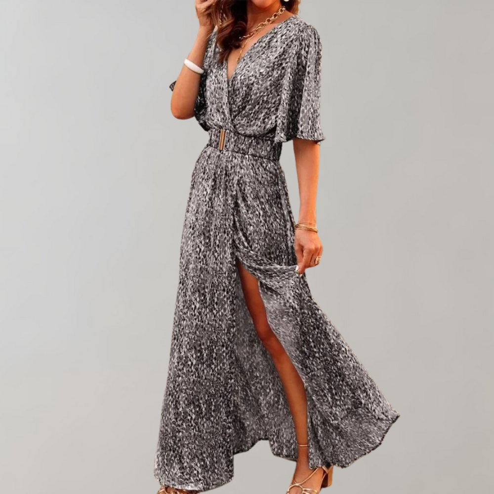 Women's summer dress with V-neck, perfect for warm days, offering comfort, breathability, and stylish versatility.






