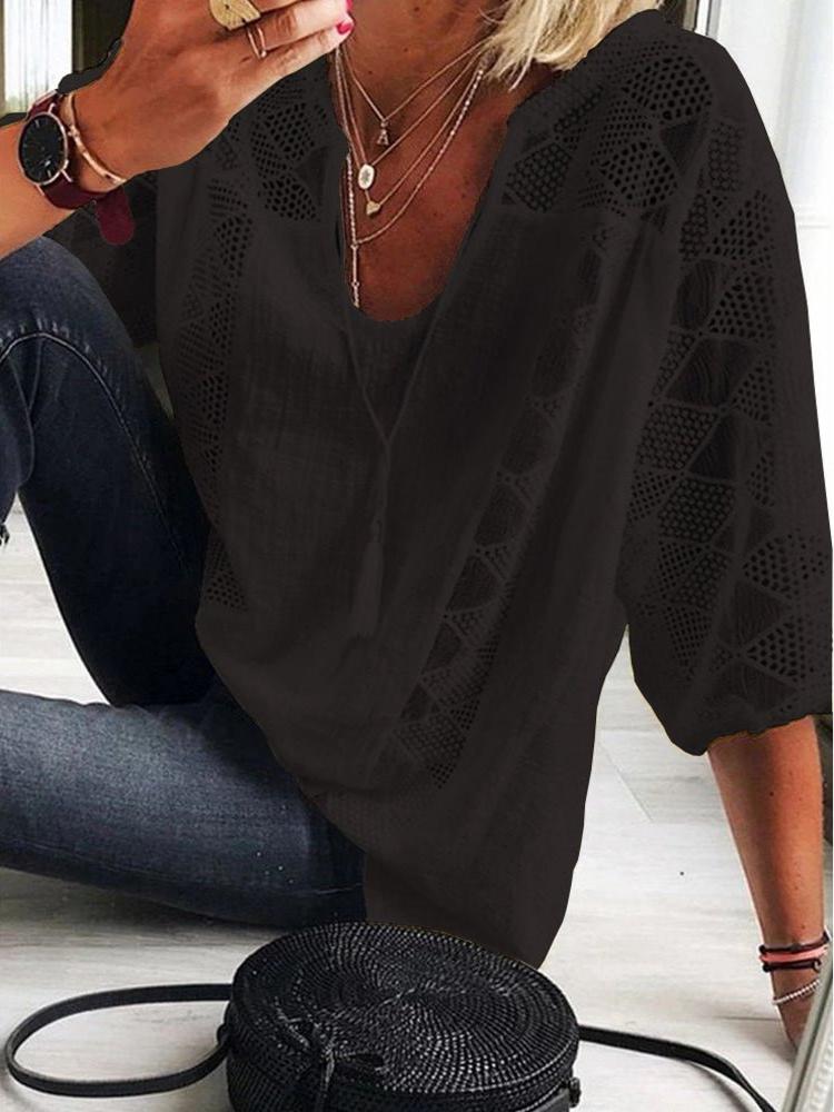 Women's summery crochet blouse, featuring breathable fabric and intricate crochet detailing, perfect for warm weather and casual occasions.