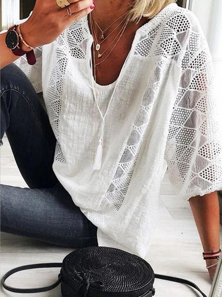 Women's summery crochet blouse, featuring breathable fabric and intricate crochet detailing, perfect for warm weather and casual occasions.