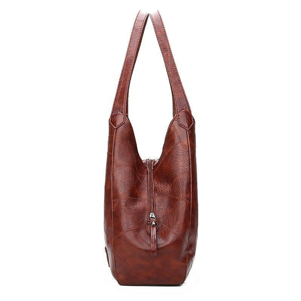 Women's Vintage Leather Bag with premium leather craftsmanship, ample storage, and a lightweight design, perfect for summer days.






