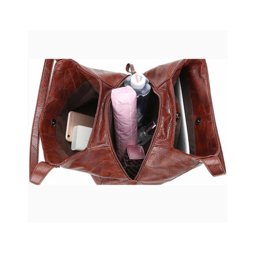 Women's Vintage Leather Bag with premium leather craftsmanship, ample storage, and a lightweight design, perfect for summer days.






