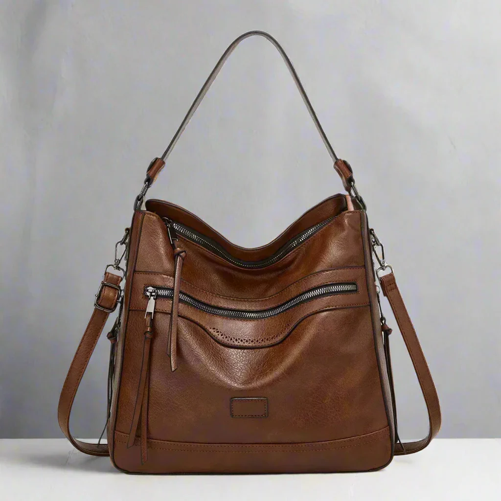 Women's vintage leather bag with a timeless design, spacious interior, and adjustable strap, ideal for both casual and formal use.






