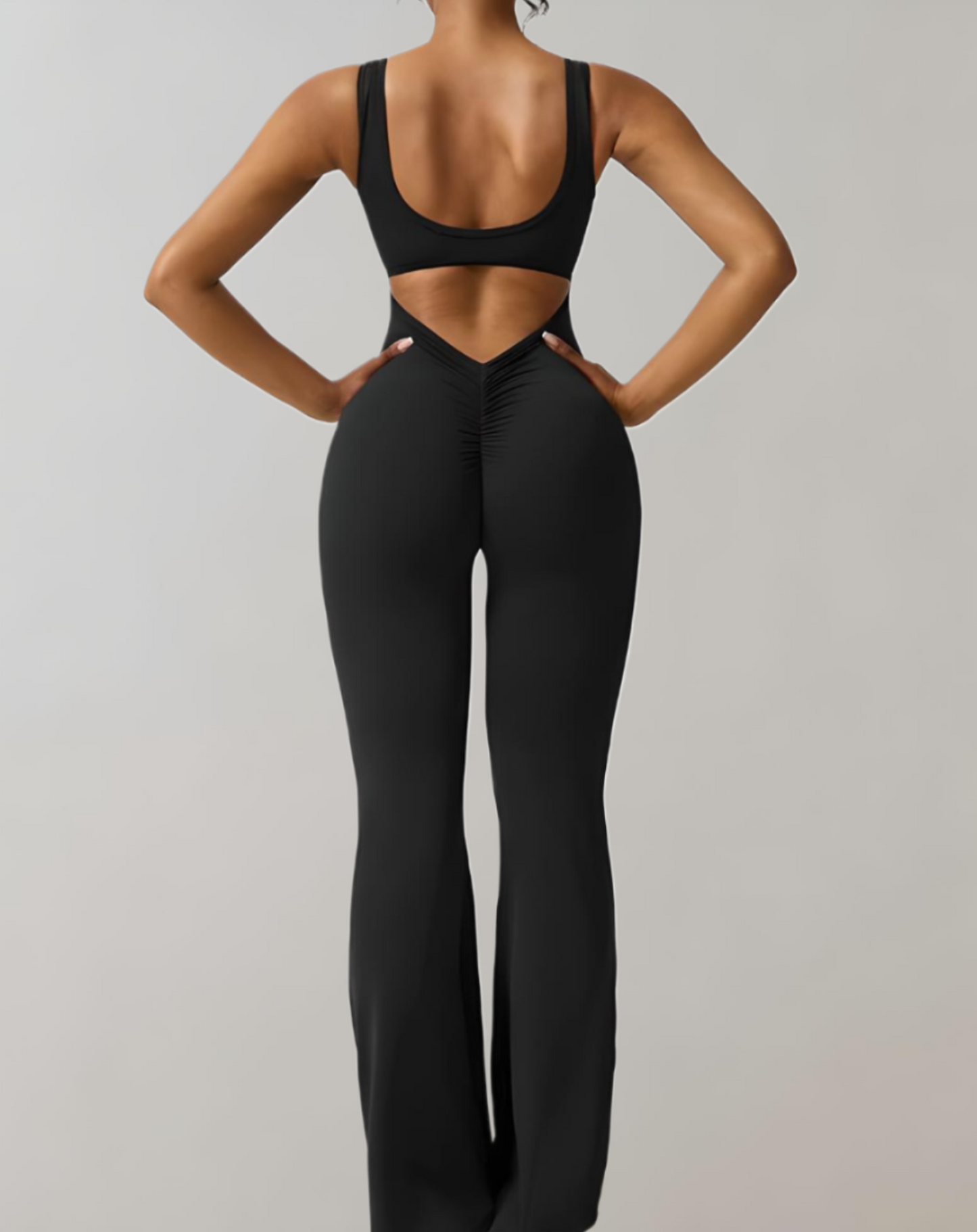 A stylish women's backless bodycon jumpsuit designed for summer wear, featuring a flattering fit and trendy design that enhances the wearer's silhouette