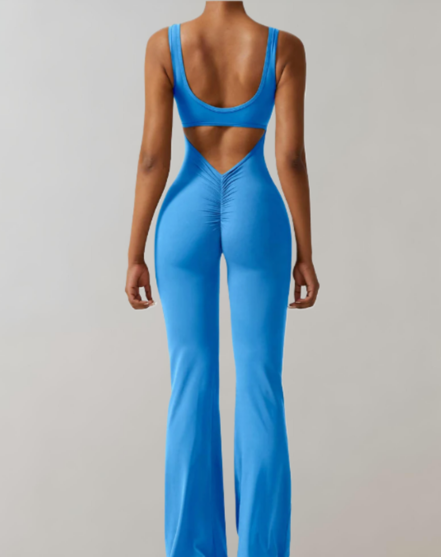 A stylish women's backless bodycon jumpsuit designed for summer wear, featuring a flattering fit and trendy design that enhances the wearer's silhouette