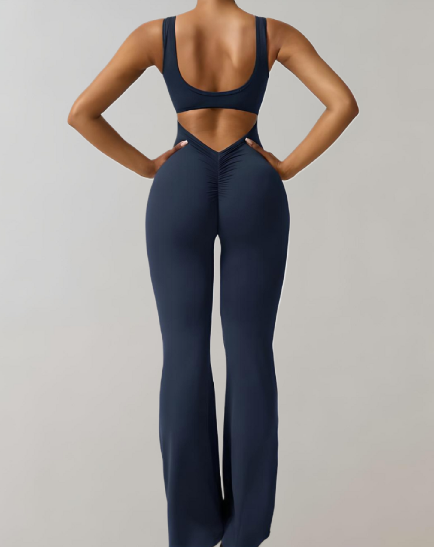 A stylish women's backless bodycon jumpsuit designed for summer wear, featuring a flattering fit and trendy design that enhances the wearer's silhouette