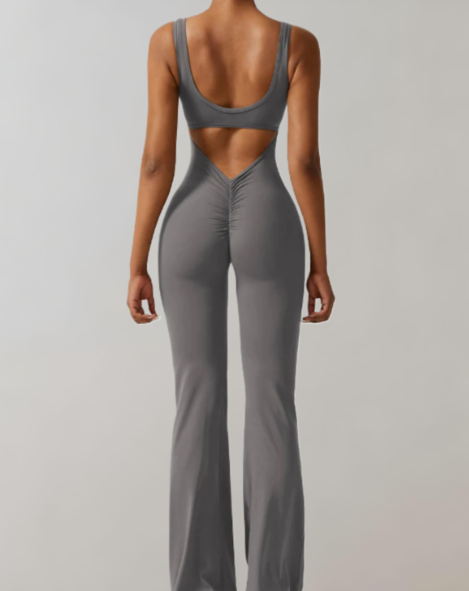 A stylish women's backless bodycon jumpsuit designed for summer wear, featuring a flattering fit and trendy design that enhances the wearer's silhouette