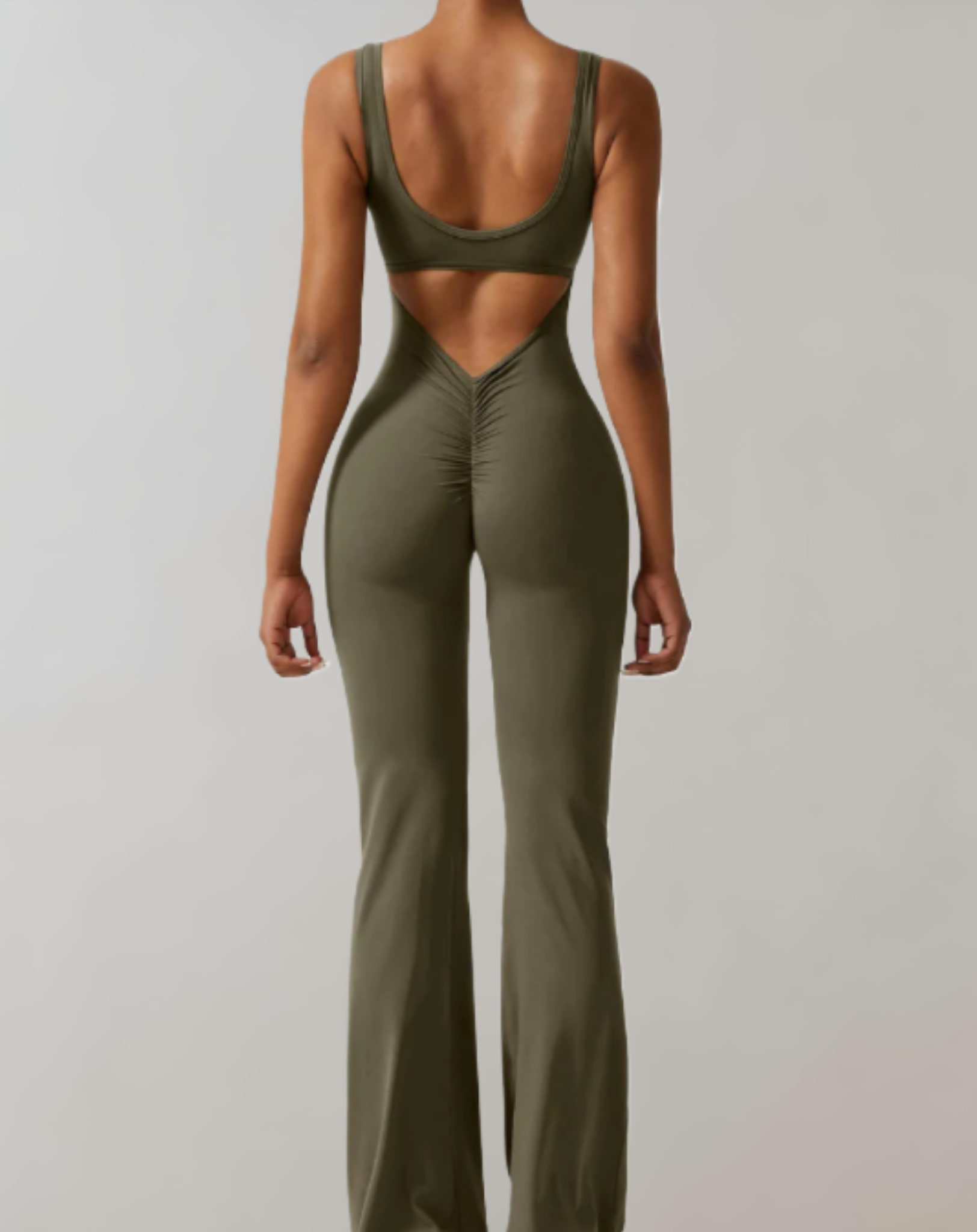 A stylish women's backless bodycon jumpsuit designed for summer wear, featuring a flattering fit and trendy design that enhances the wearer's silhouette