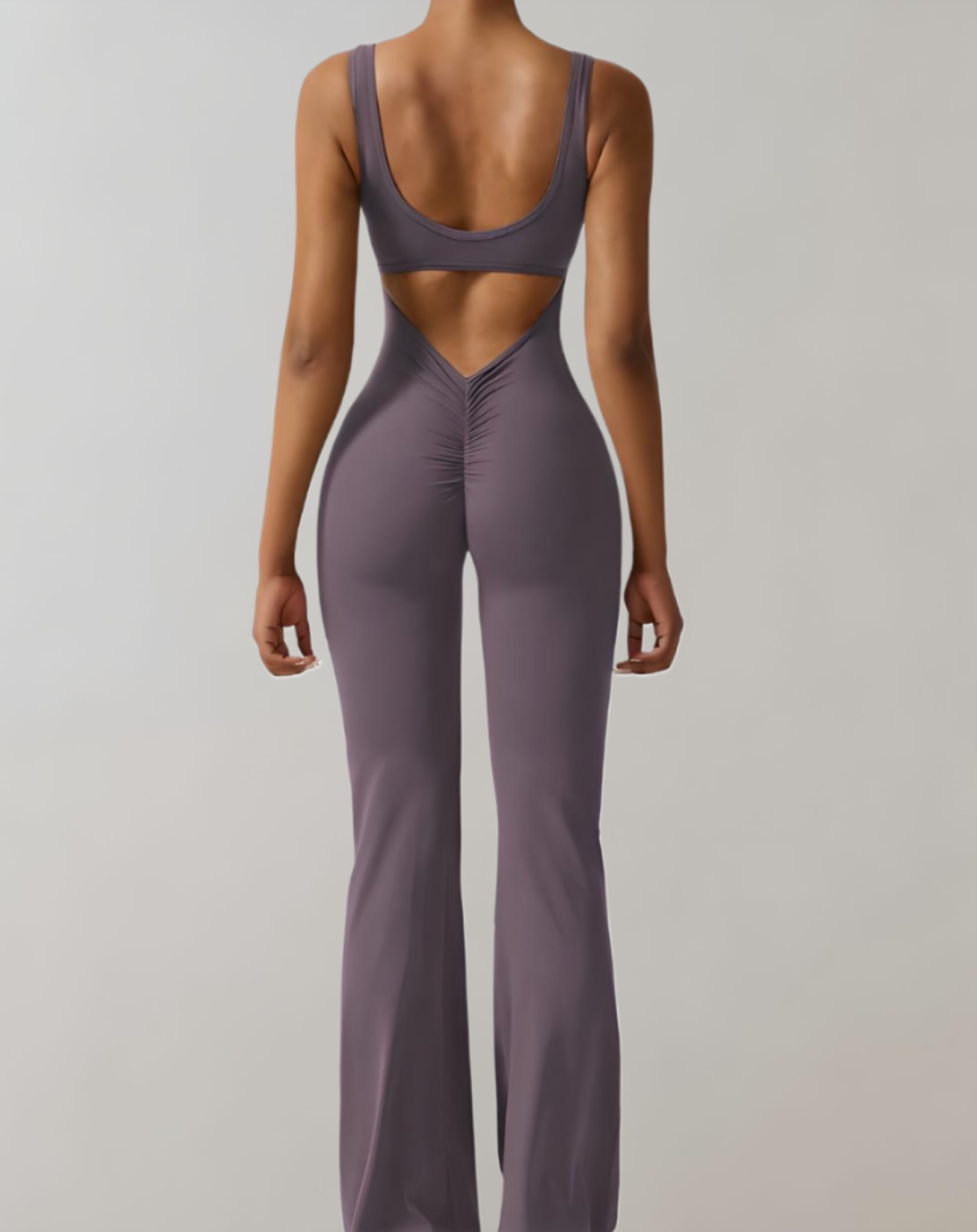 A stylish women's backless bodycon jumpsuit designed for summer wear, featuring a flattering fit and trendy design that enhances the wearer's silhouette