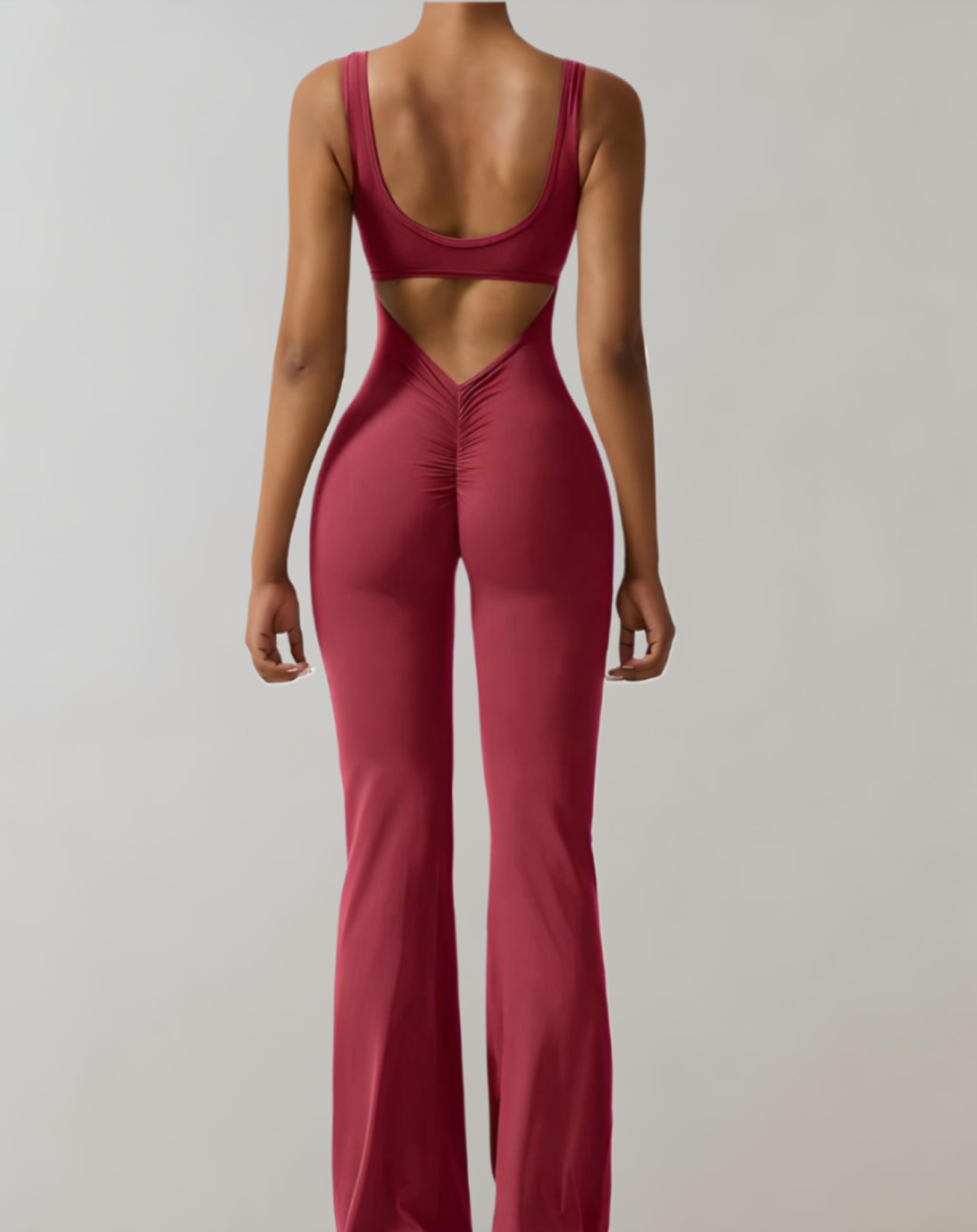 A stylish women's backless bodycon jumpsuit designed for summer wear, featuring a flattering fit and trendy design that enhances the wearer's silhouette